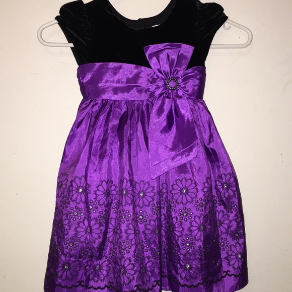 purple frilly dress